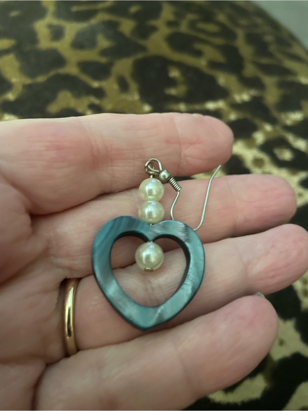 Hand carved mother of pearl earrings with pearl accents
